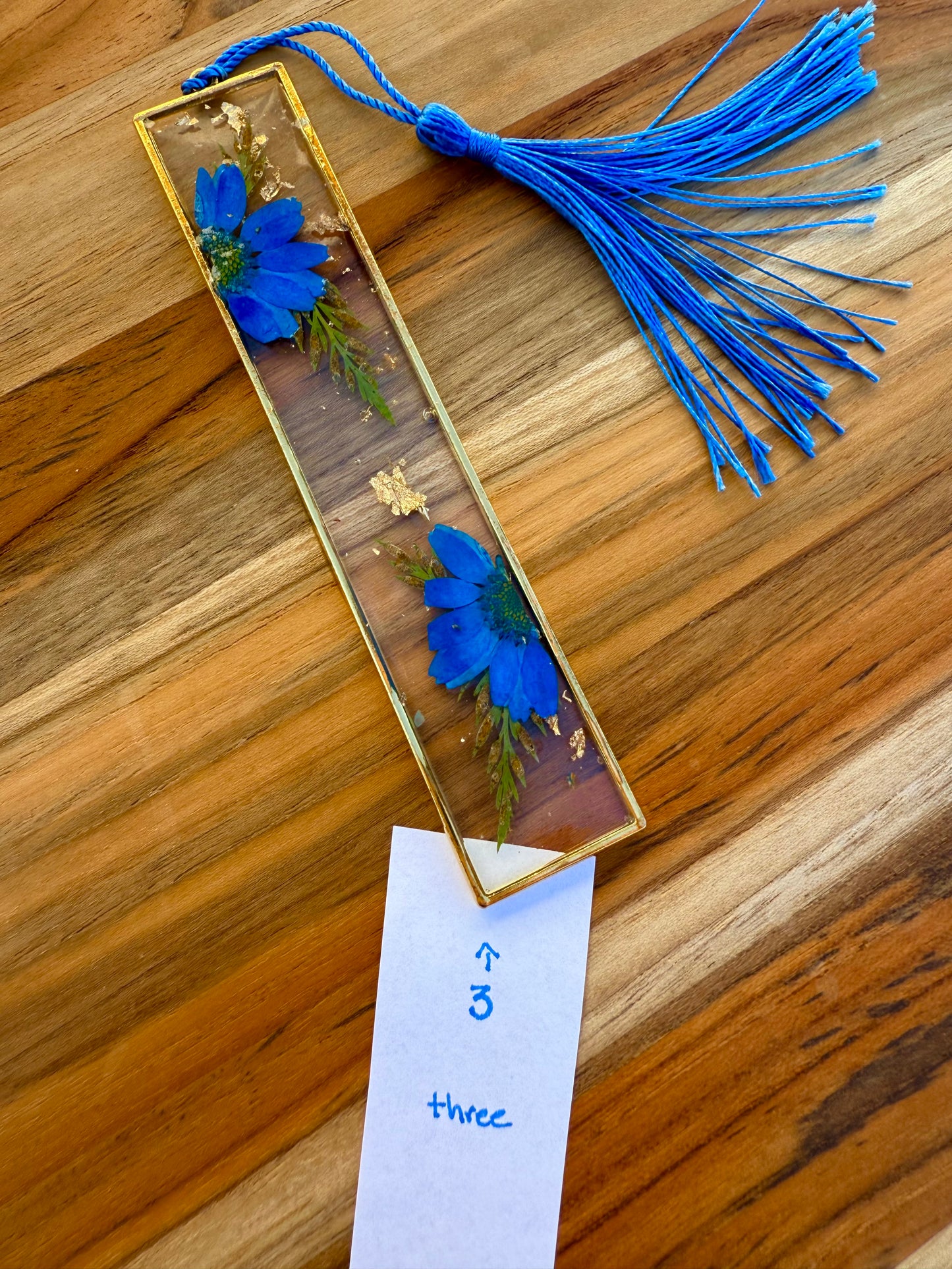 Handmade resin bookmark with dried flowers